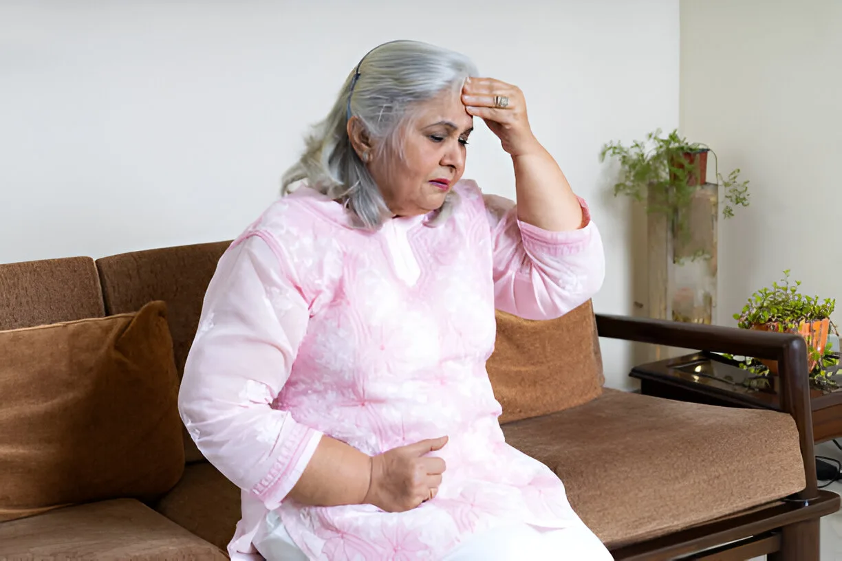 Elderly woman feeling unwell