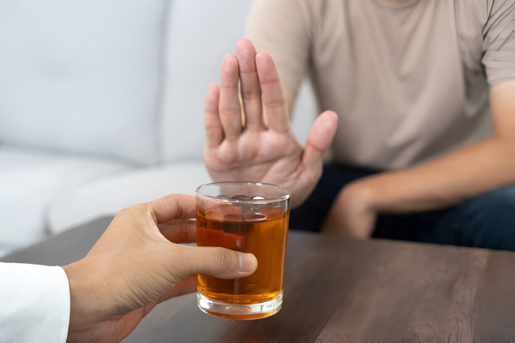 man saying no to alcohol