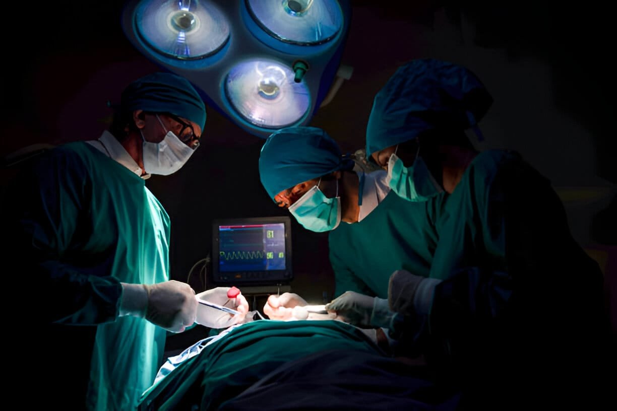 doctors performing surgery
