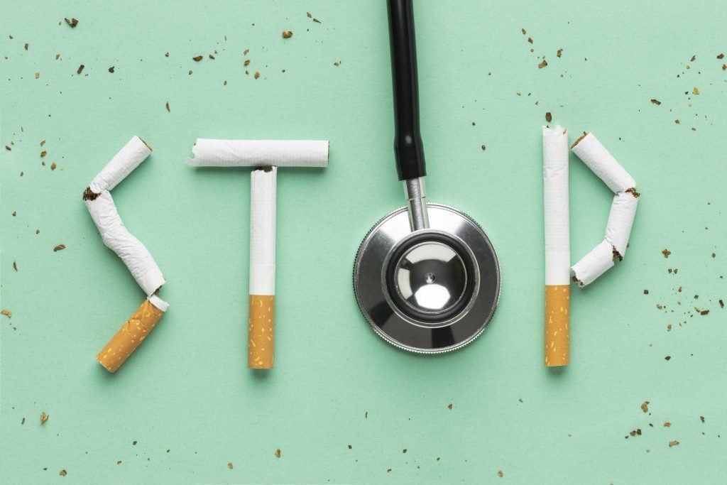 STOP smoking sign with stethoscope